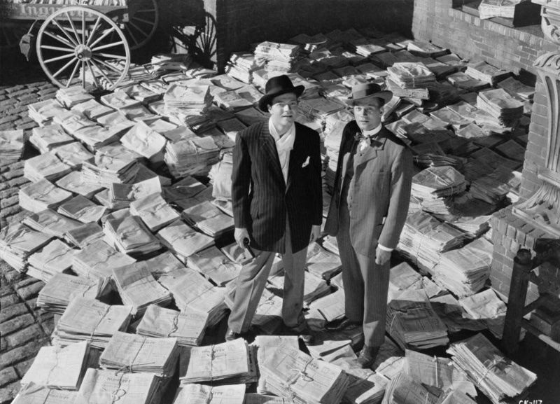 1940s Men's Fashion. Relaxed Pinstripe Suiting: Orson Welles and Joseph Cotten, pictured left to right, in the 1941 classic Citizen Kane.