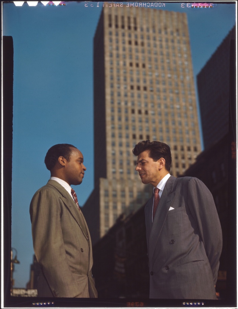 Musician Joe Marsala wears a double-breasted suit jacket on 52nd in New York circa 1948.