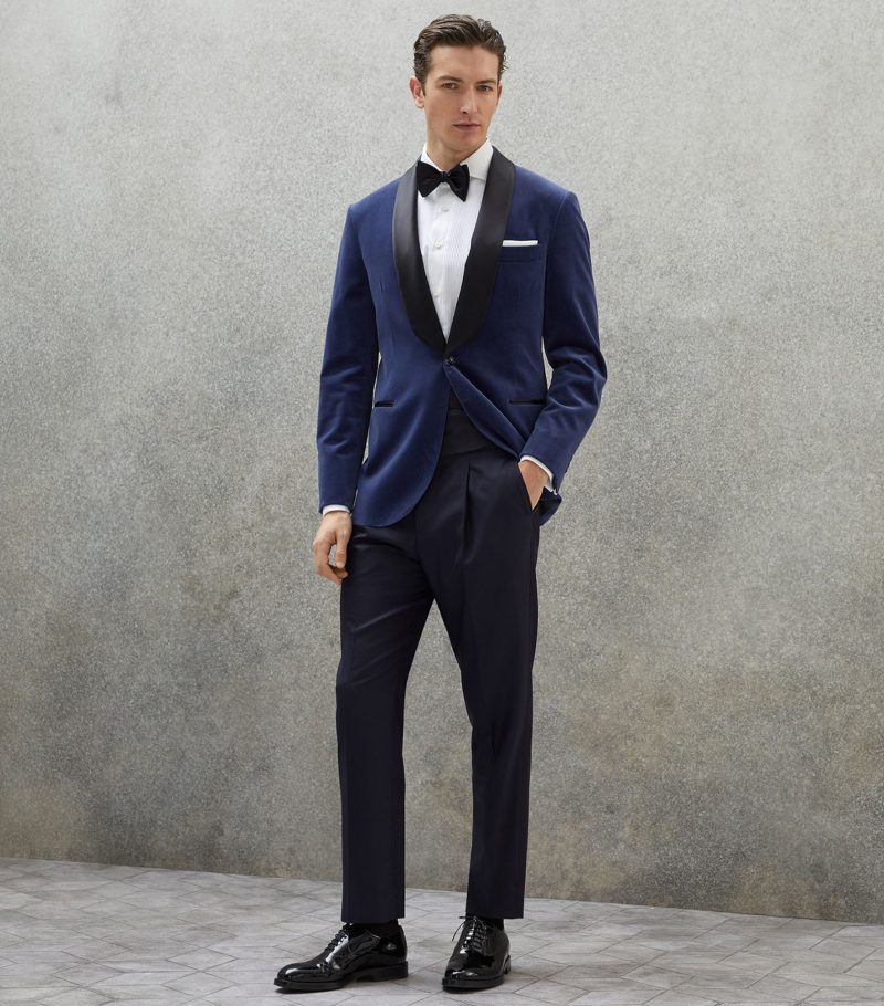 Ring in the New Year in a blue velvet dinner jacket from brands like Brunello Cucinelli.