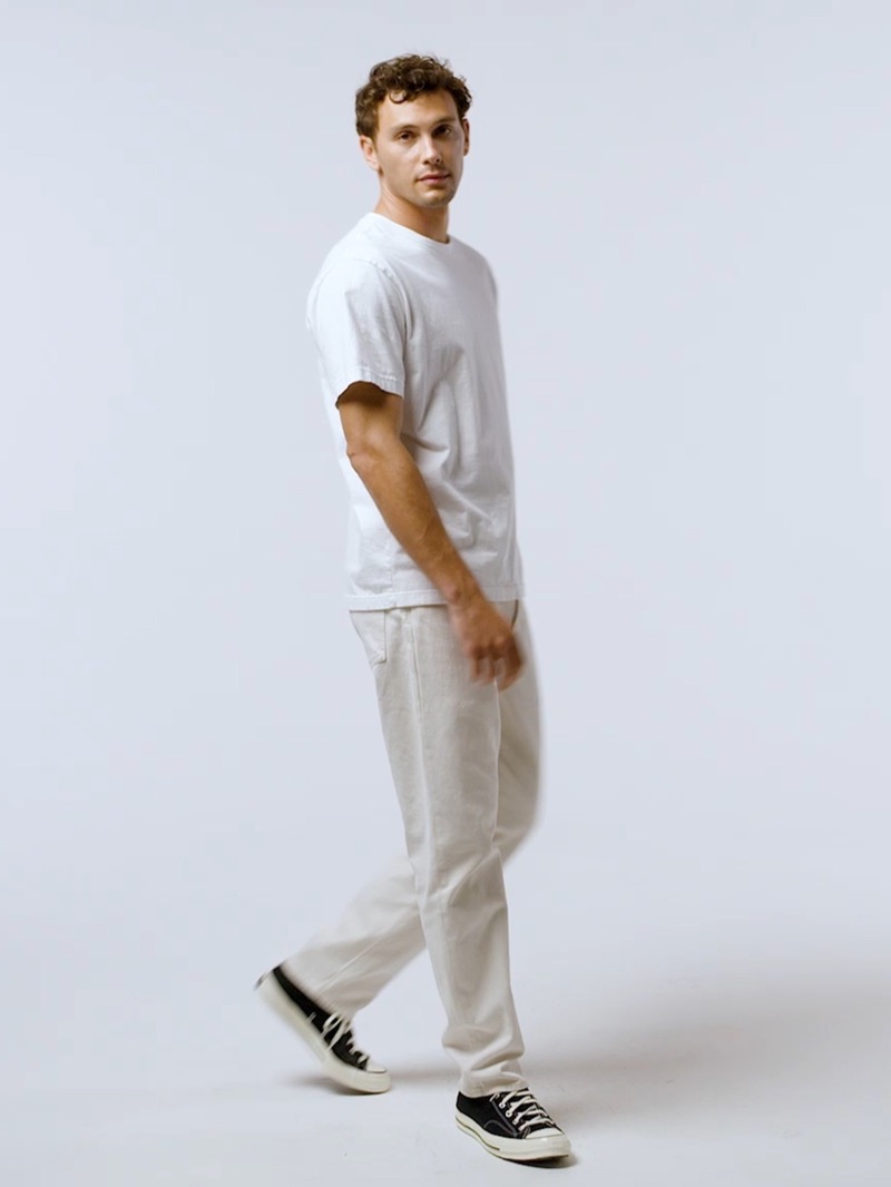 Embracing minimalist style, Cooper Koch wears a Gap Original tee and straight jeans.