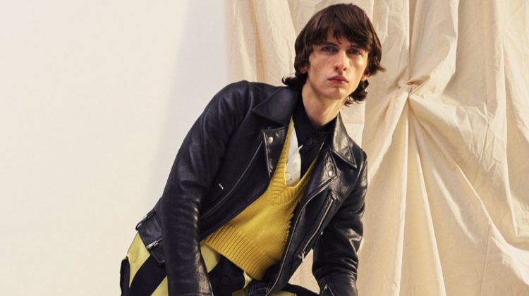 Benno Bulang stands out in a statement leather biker jacket from Bottega Veneta.