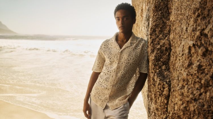 Stan Taylor models a regular-fit crochet-look resort shirt with regular-fit lyocell shorts.